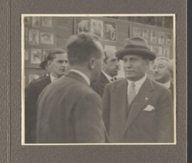 Benito Mussolini e Guido Ucelli (di spalle)
